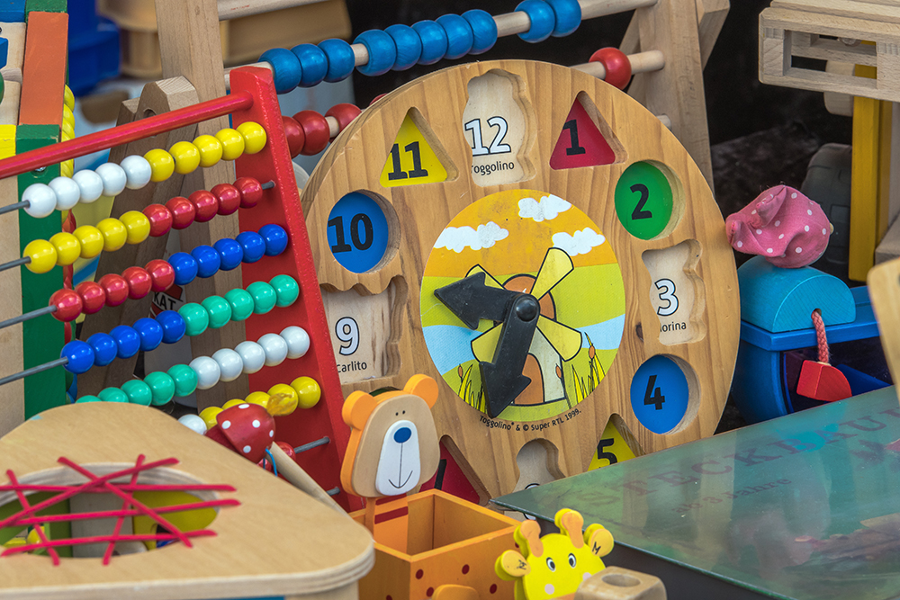 Market stall with objects and children toys sold at the weekend